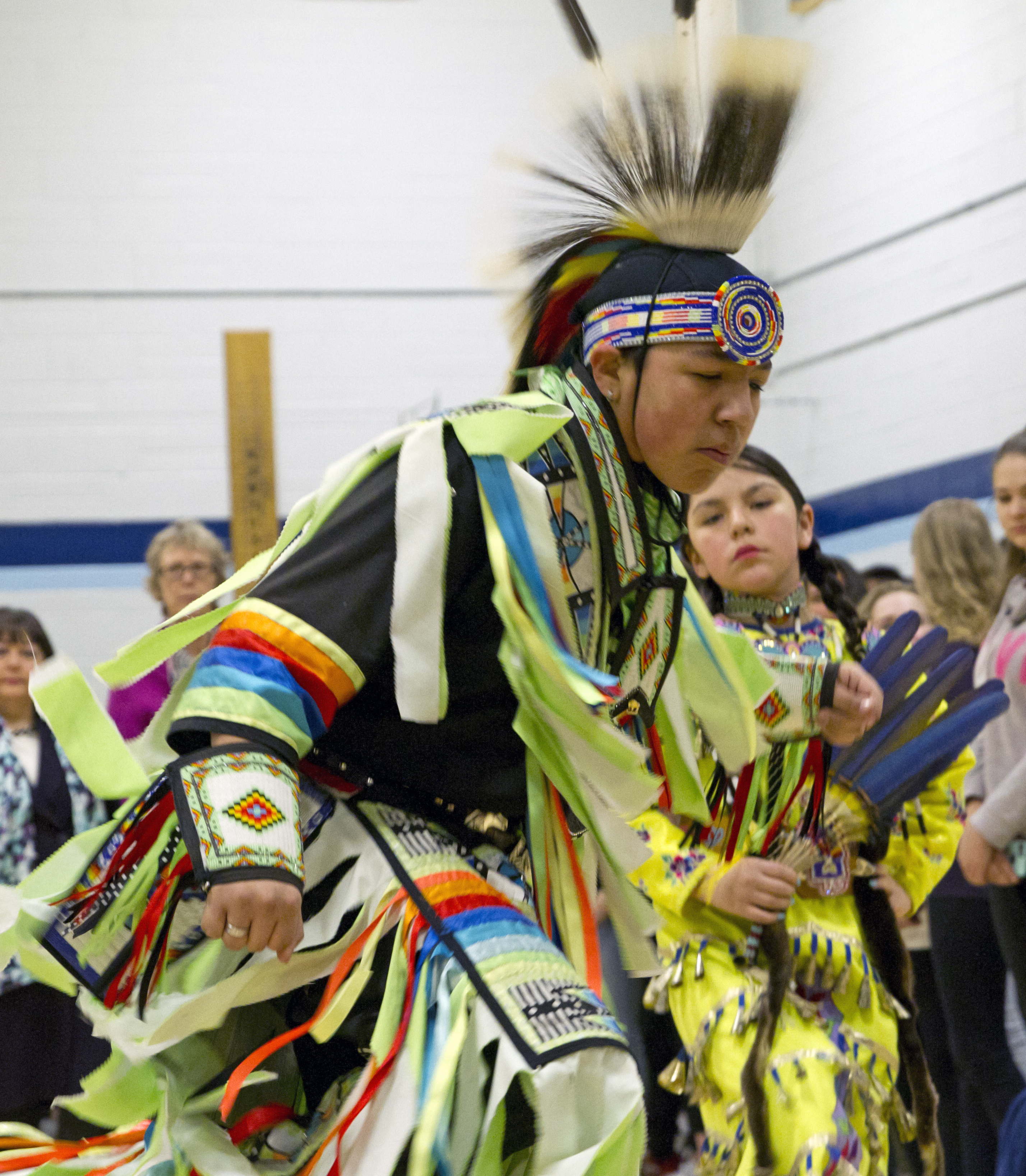 Photo: Pow wow dancers perform during the grand entry for the Rights Here, Rights Now Conference.